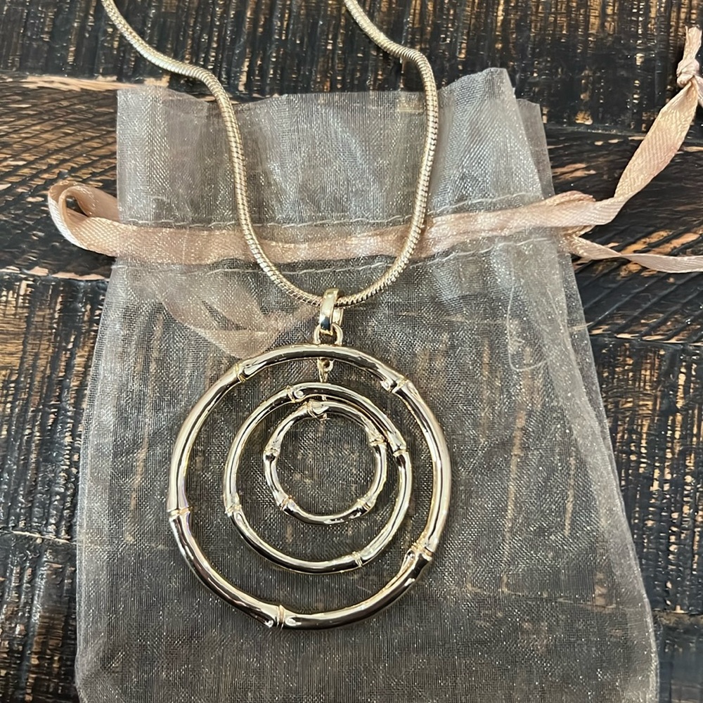 Gold chicos necklace with circles pendant